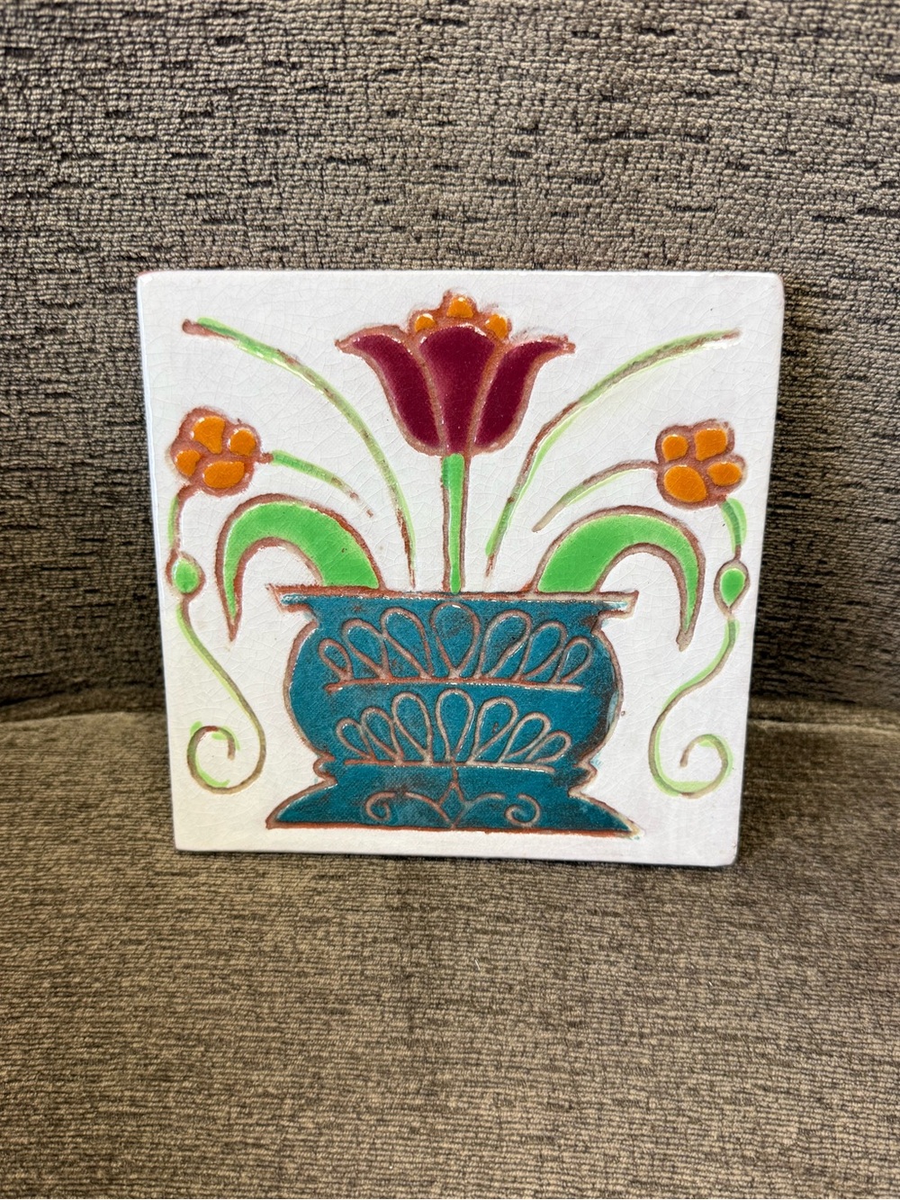Marblehead Tileworks Hand-Painted Floral Tile Wall Art in Teal, Maroon & Orange.